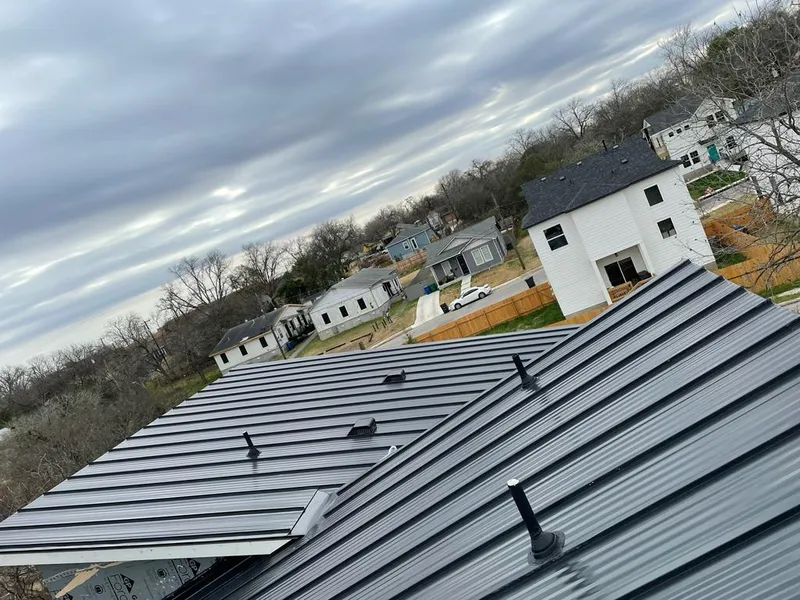 Standing seam metal roof panels with vents for Skylight Repair in Independence